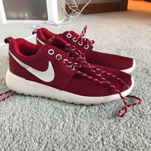 Red Nike Roshe’s. Worn once.
